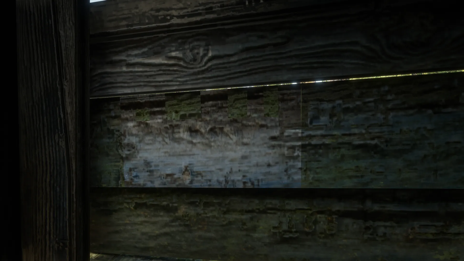 The blocky Fort Brennand outline painted on boards inside Outhouse 4.